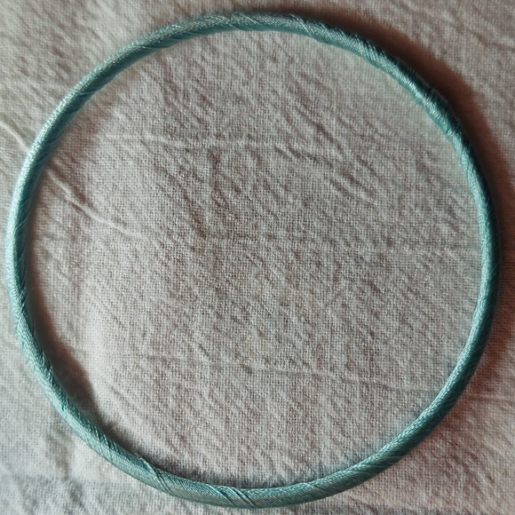 3 yarn bracelets. 1 orange/lavender, 1 green/blue, 1 mint green. - Picture 4 of 5